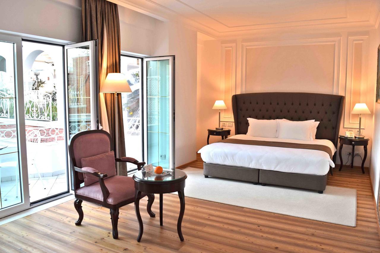 Xheko Imperial Luxury Hotel & Spa 地拉那 外观 照片 A bedroom at the hotel